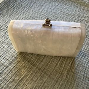 Pearl white  Anthropologie purse. Option to have metal strap. Suede inside.